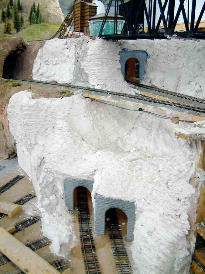 Scenery work behind Midway roundhouse (Heller, Rowe)