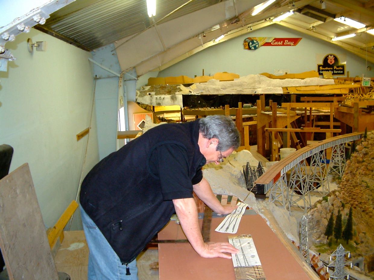 Jeff Heller checking turnouts 16 Feb 03