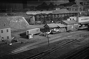 Click on thumbnail to enlarge ebmes_ho_layout_key_system_cars_crossing_over_a_wp_way_freight_on_bakerfield_lead._proofs-1984__dan_smith.jpeg